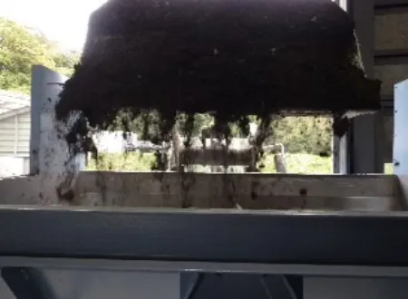 油混り汚泥 ①定量フィーダに投入